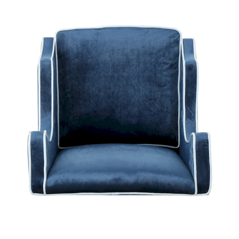 Poltrona decorativa con schienale alto e ali, rivestita in velluto, bordino bianco e gambe in legno nero
