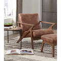 Poltrona decorativa moderna di metà secolo con struttura in legno di rubberwood, pelle vegana e bouclé