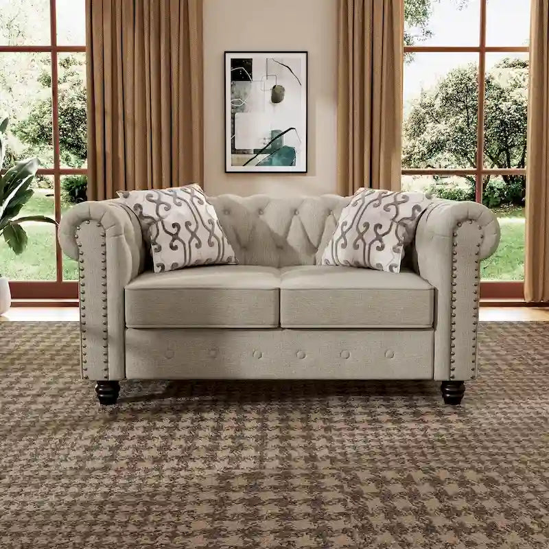 Divanetto Chesterfield imbottito trapuntato con bottoni, bordino con borchie e gambe in legno massello