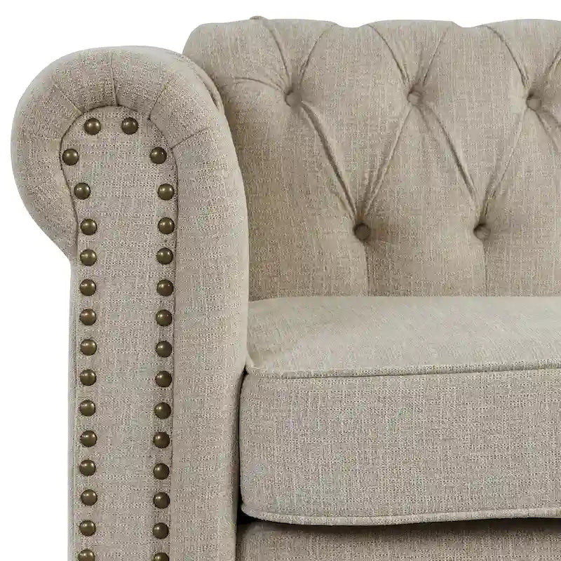 Divanetto Chesterfield imbottito trapuntato con bottoni, bordino con borchie e gambe in legno massello