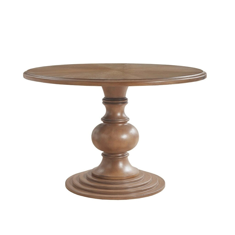 Tavolo da pranzo rotondo con base a piedistallo scultorea, noce di recupero e finitura color crema anticato
