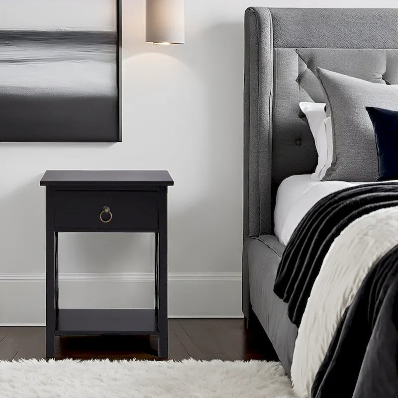 Comodino in legno con cassetto, ripiano aperto e struttura laterale a X