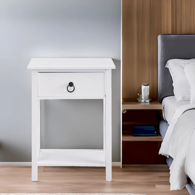 Comodino in legno con cassetto, ripiano aperto e struttura laterale a X