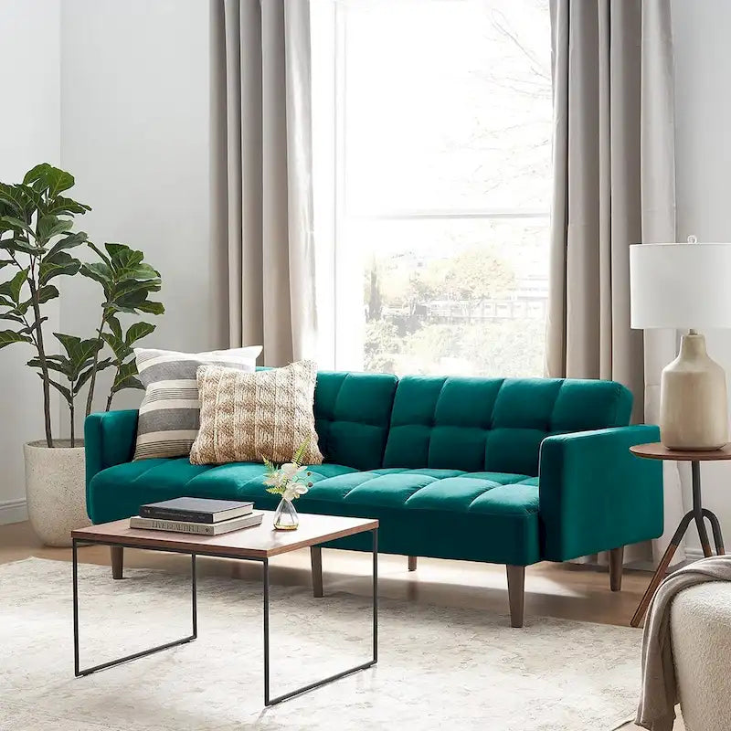 Divano futon trasformabile moderno di metà secolo, trapuntato, con funzione letto e gambe affusolate